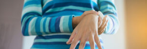 Close up of hand woman suffering with Parkinson disease